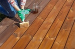 How Can Homeowners Maintain Their Custom Wood Decks Year-Round in Minnesota?